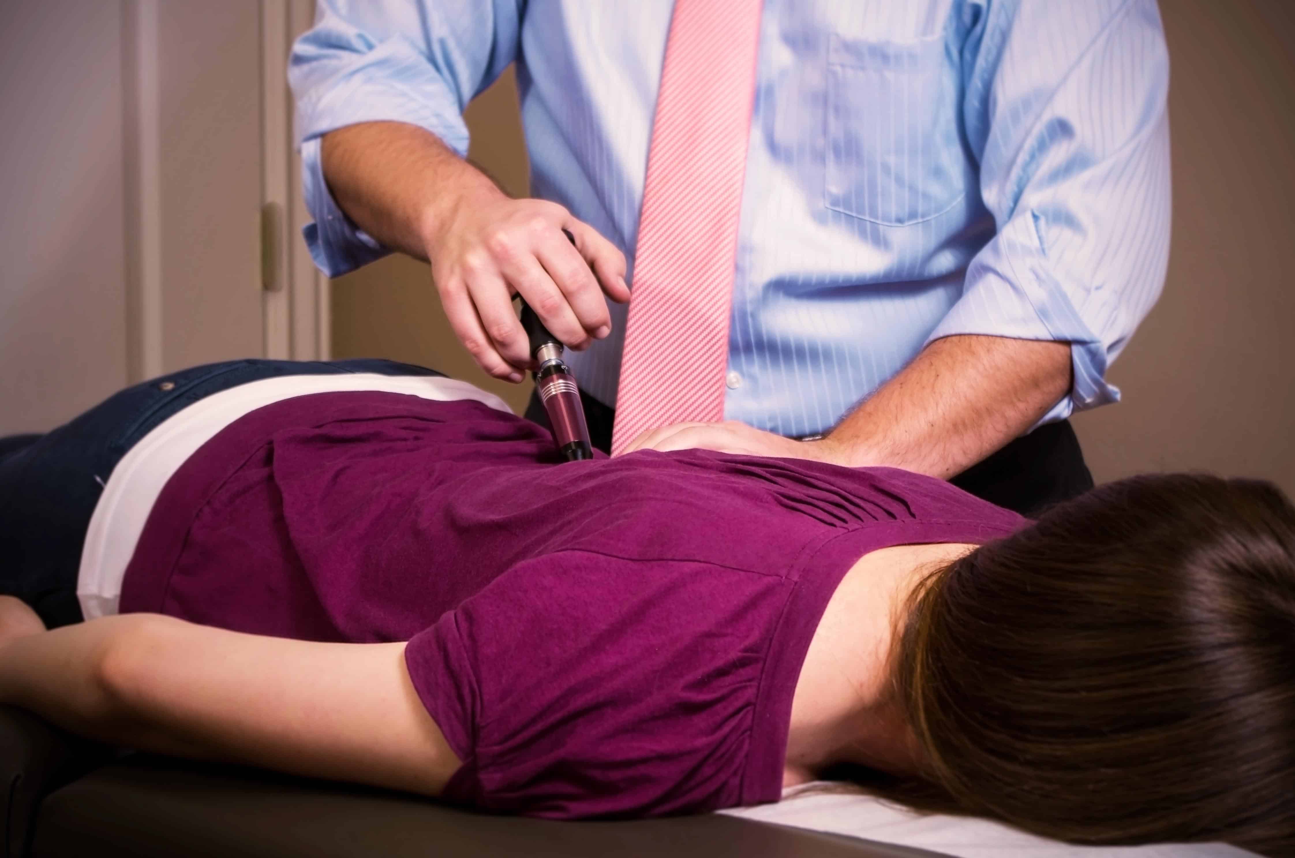 Activator Chiropractic adjustment