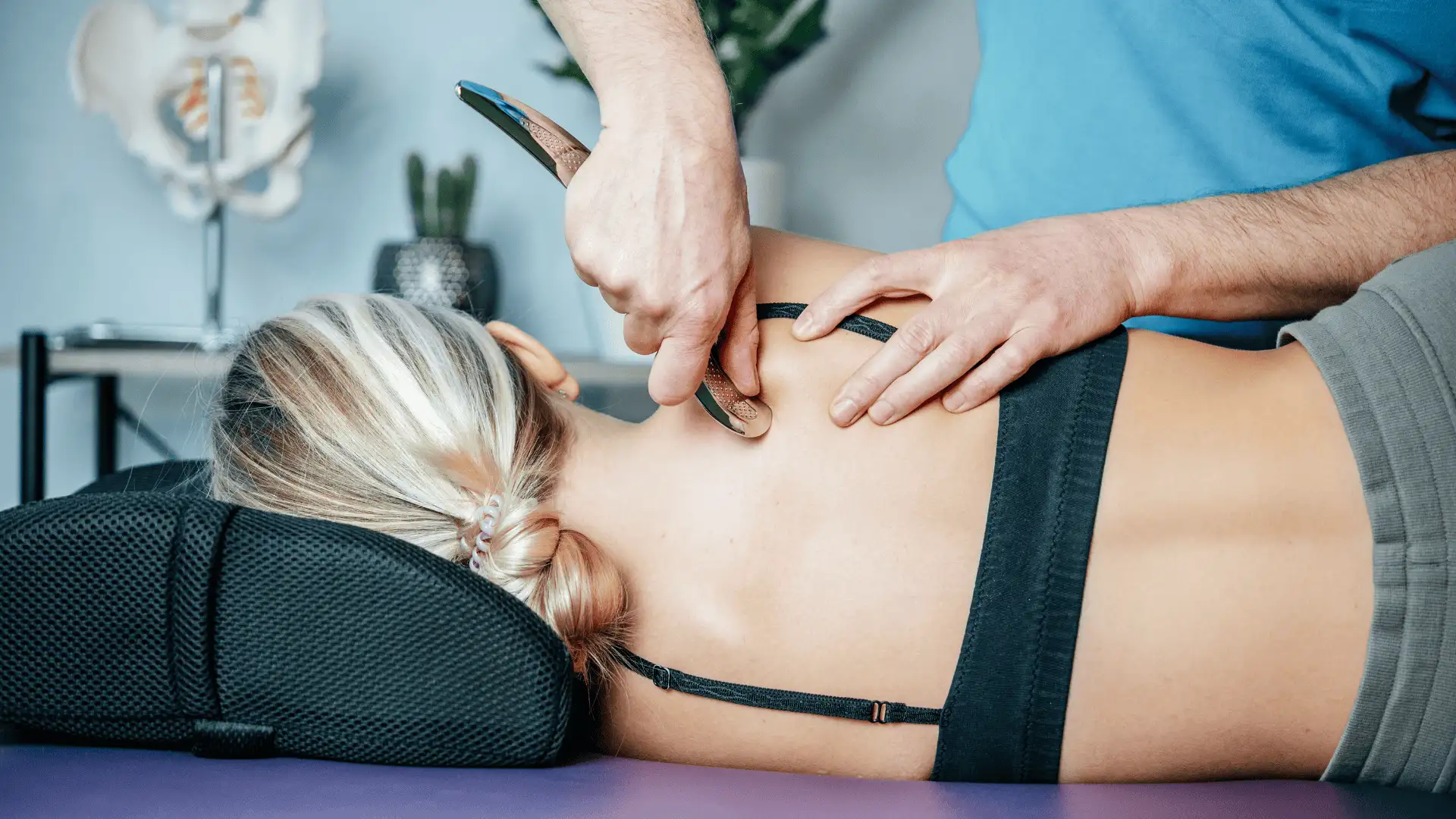 Joint Clearing technique being used on woman's shoulder