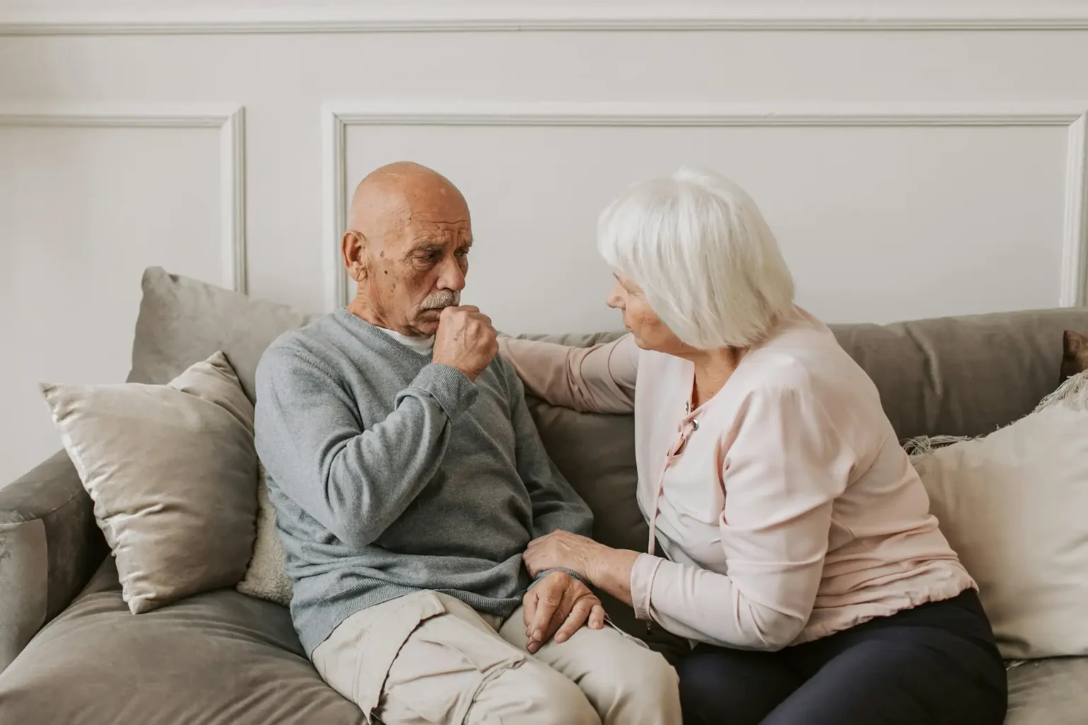Man having difficulty breathing due to asthma