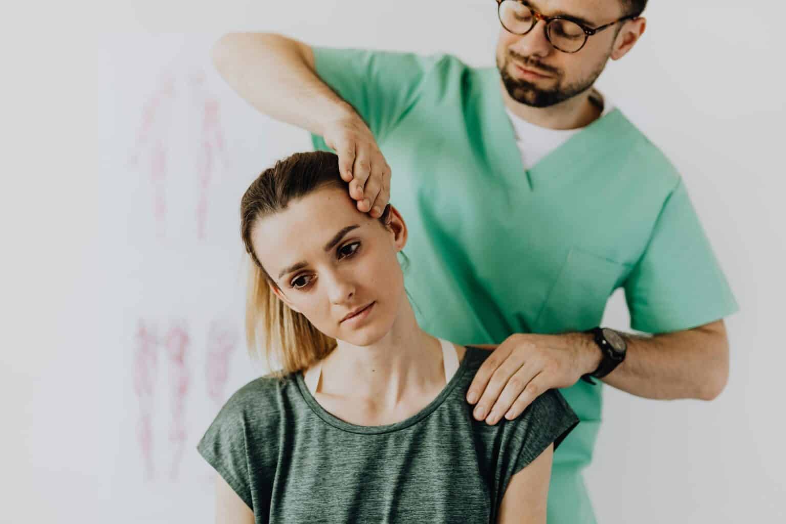 Woman getting chiropractic adjustment