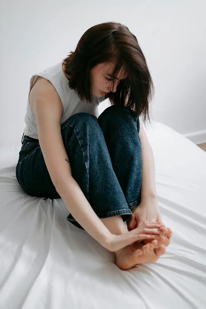 Woman with chronic pain and mobility issues experiencing stress