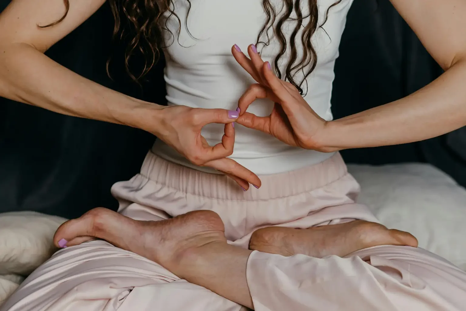 Woman with hypermobility sitting cross-legged