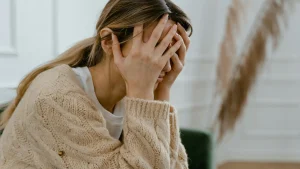 Woman suffering from migraine, stress headache