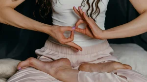Woman with hypermobility sitting cross-legged
